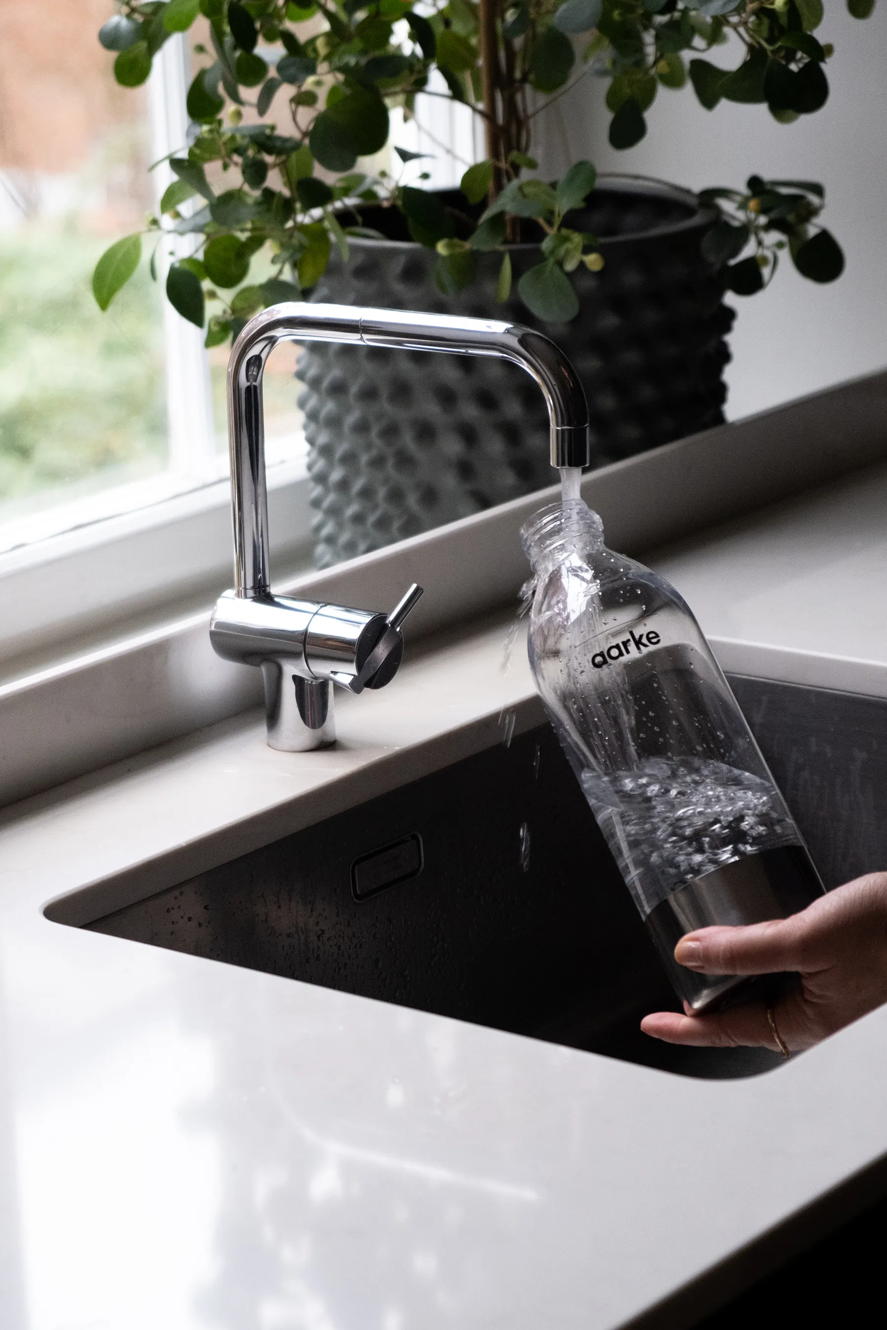 Aarke PET vannflaske 1 L, Polished steel Aarke