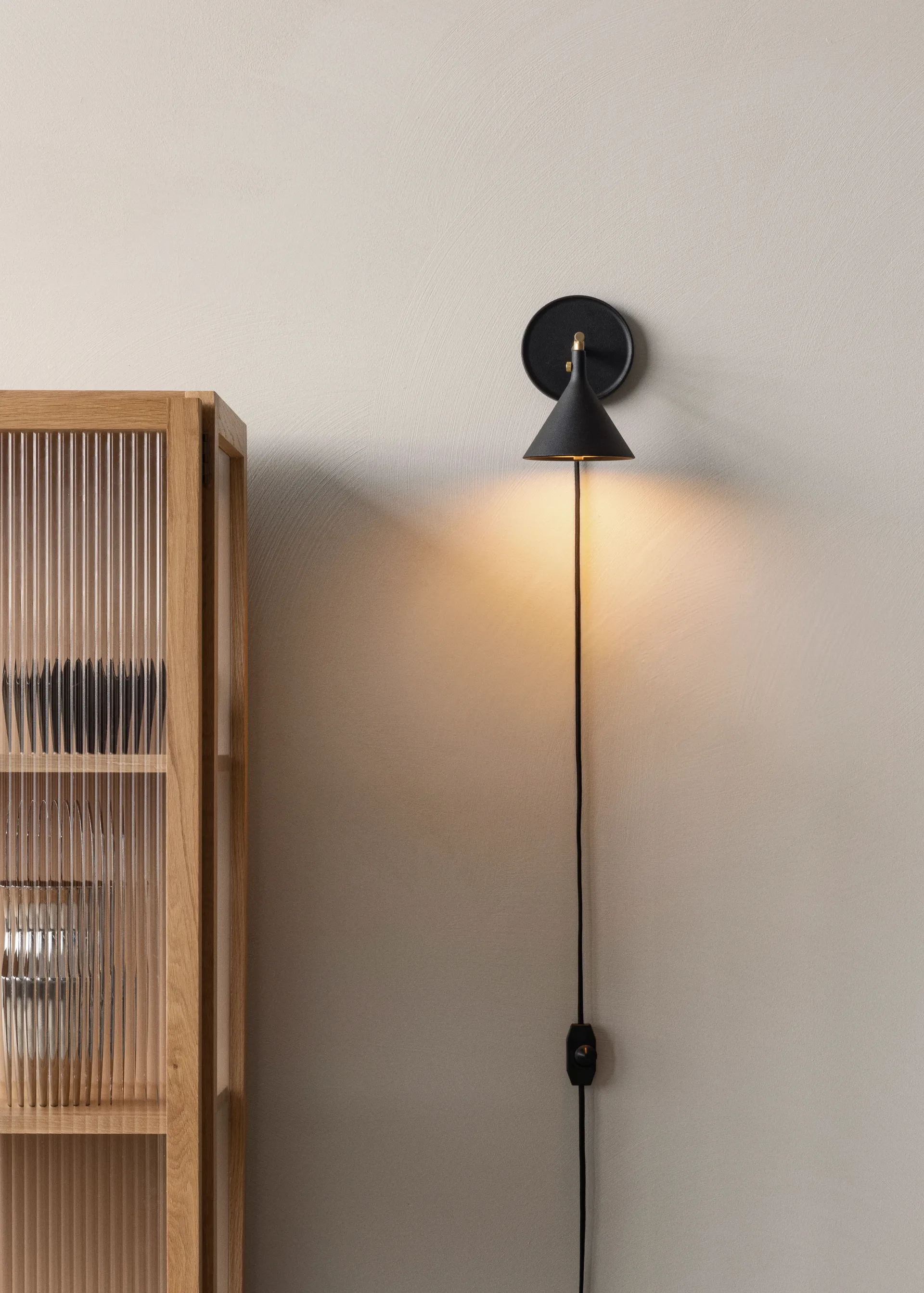 Cast Sconce vegglampe, Svart Audo Copenhagen