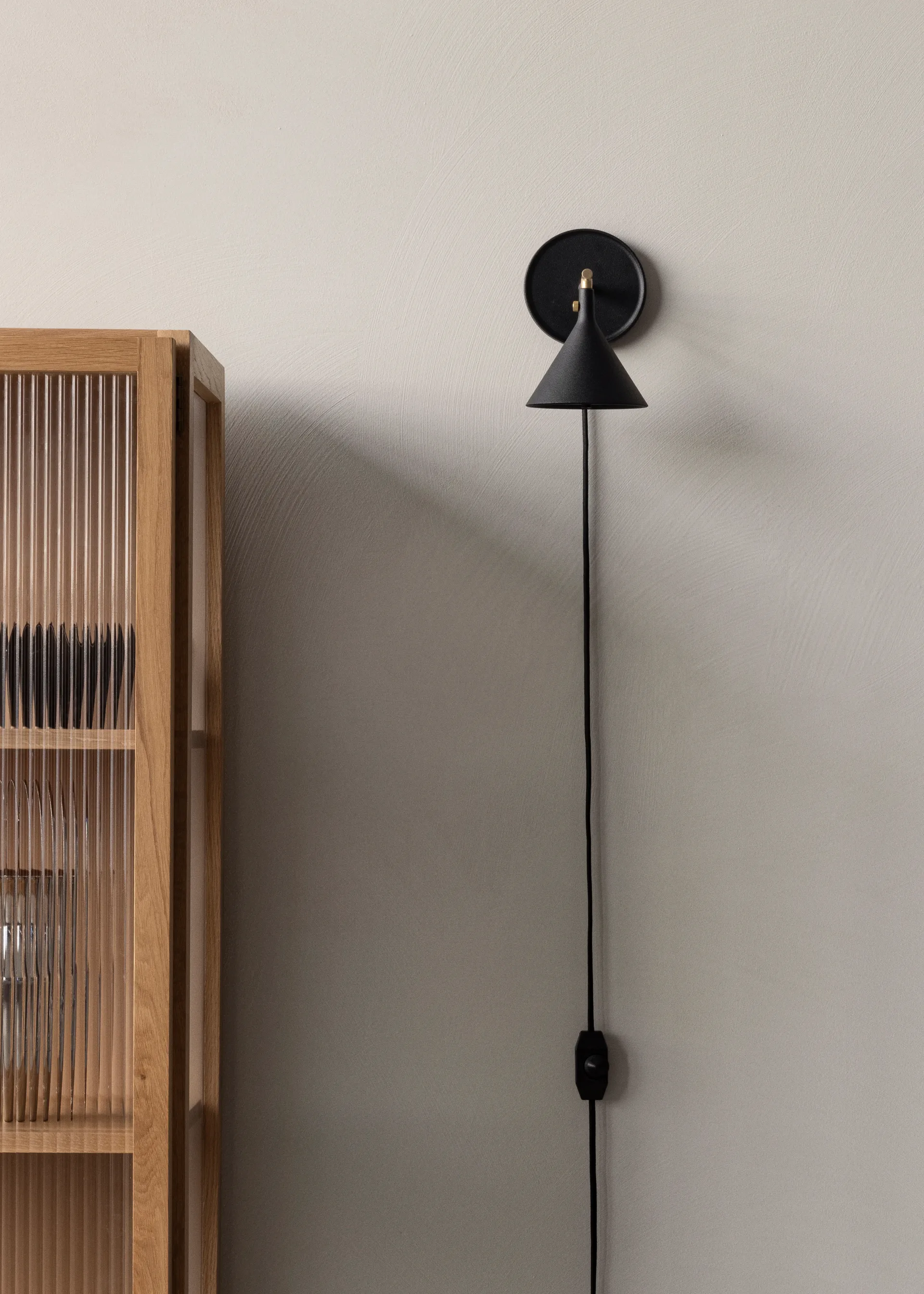 Cast Sconce vegglampe, Svart Audo Copenhagen