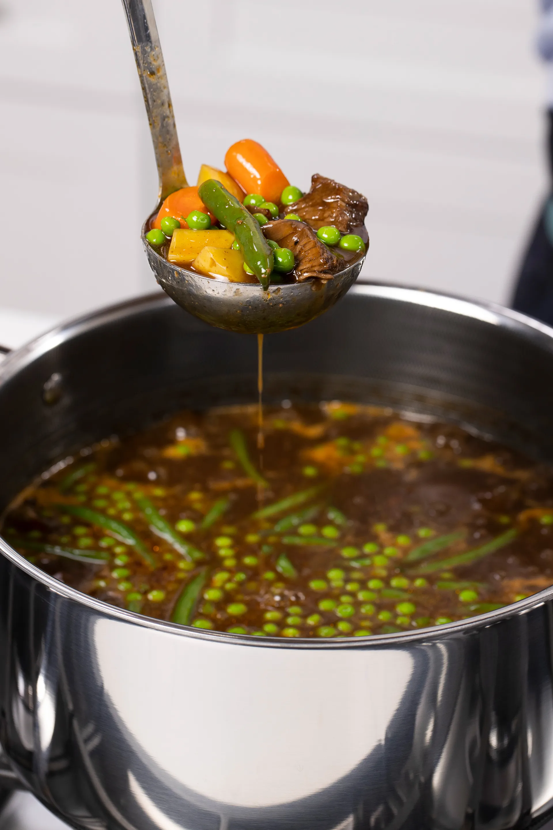 Hexclad hybridgryte med glasslokk 7,6 L, Sølv Hexclad