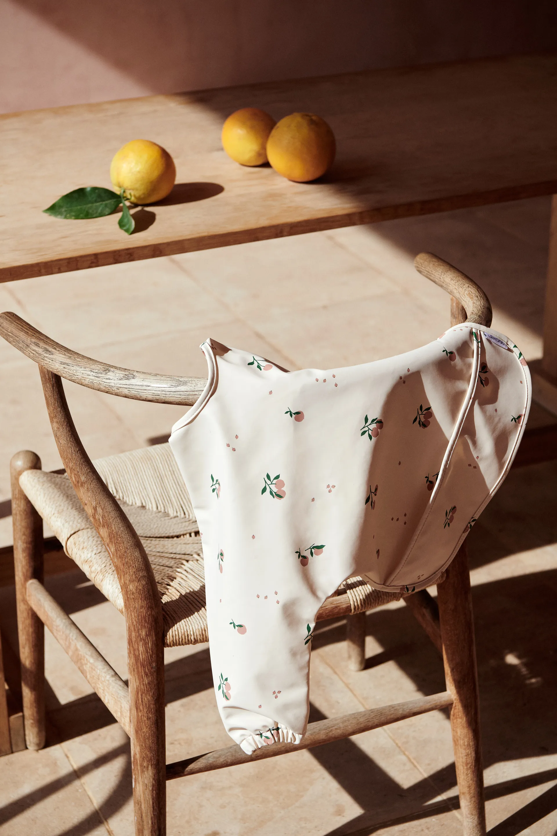 Merle smekke med erme, Peach-Sea shell mix Liewood