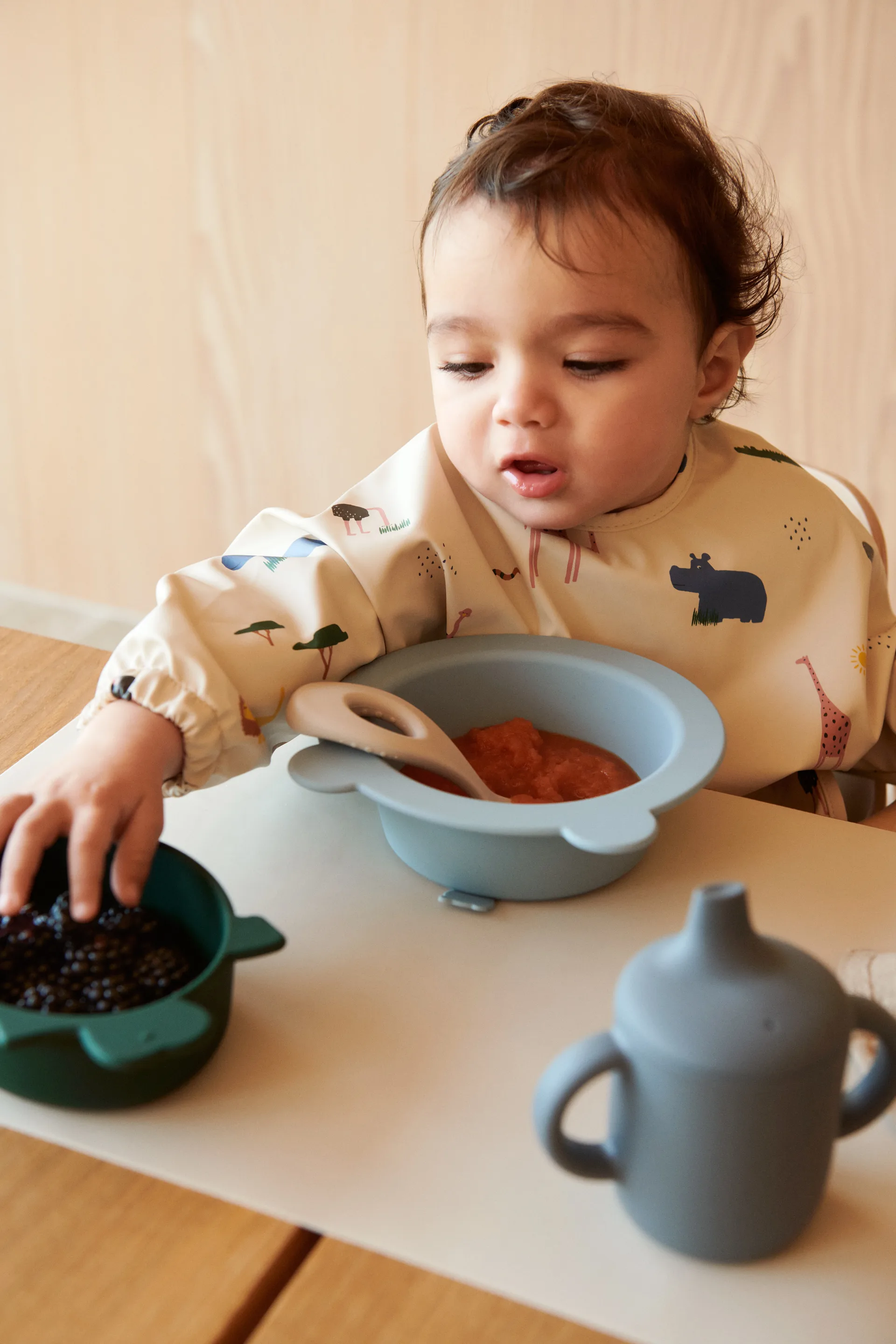 Merle smekke med erme, Safari sandy mix Liewood