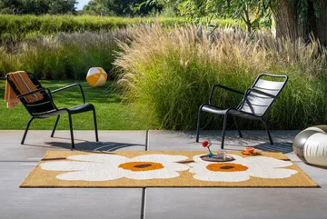 Unikko anniversary teppe outdoor - Honey, 140x200 cm - Marimekko
