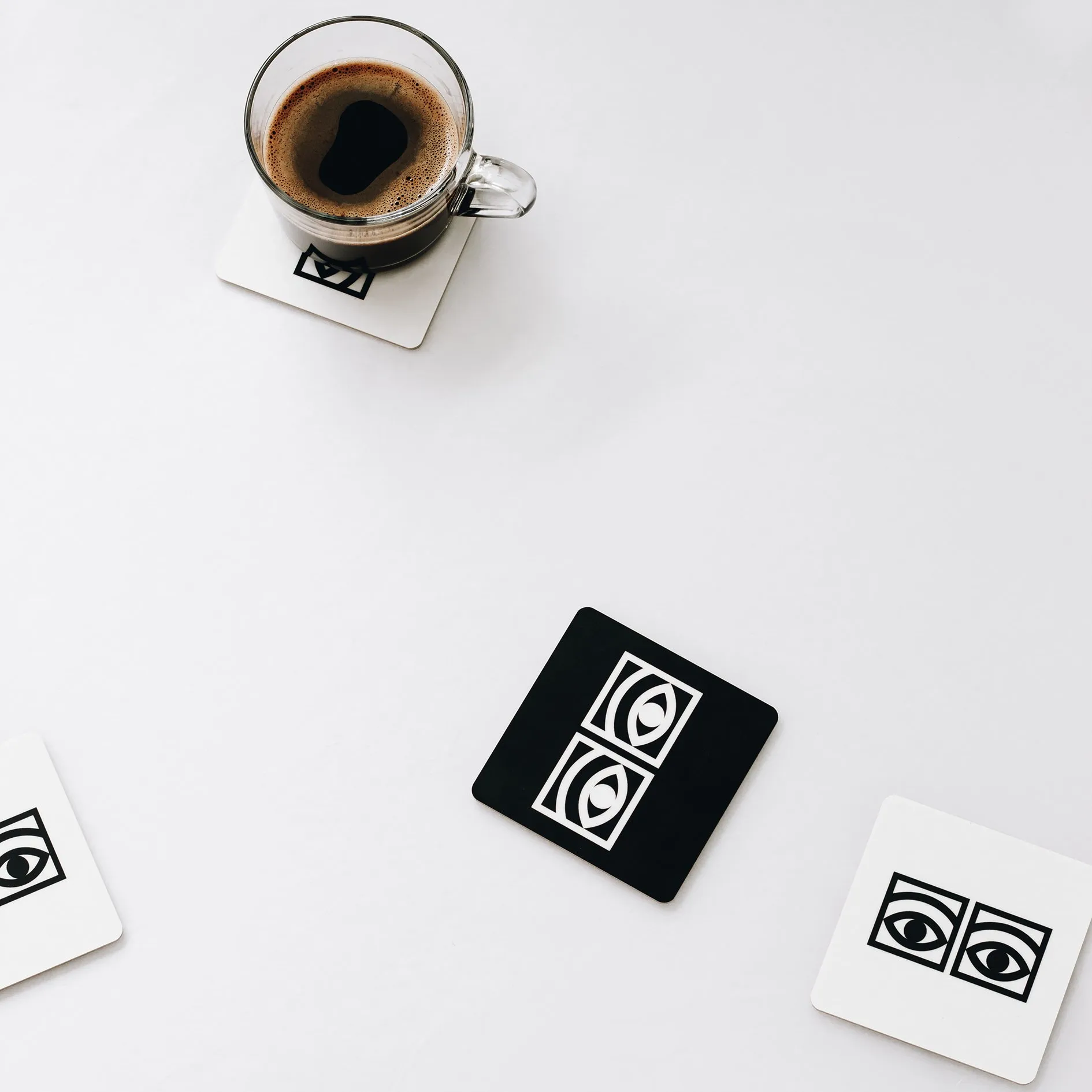 Ögon glassunderlegg 4-pakn., hvit Olle Eksell