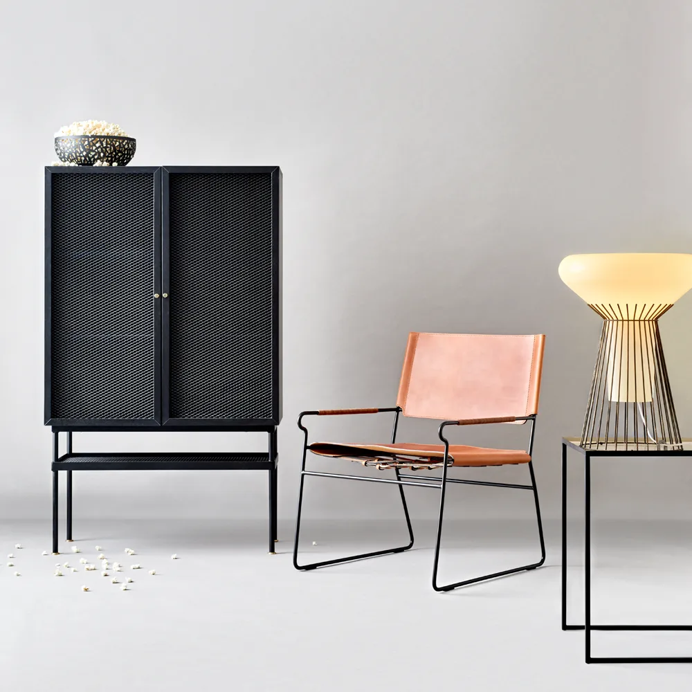 New Rest lenestol, Skinn cognac, sort stativ OX Denmarq