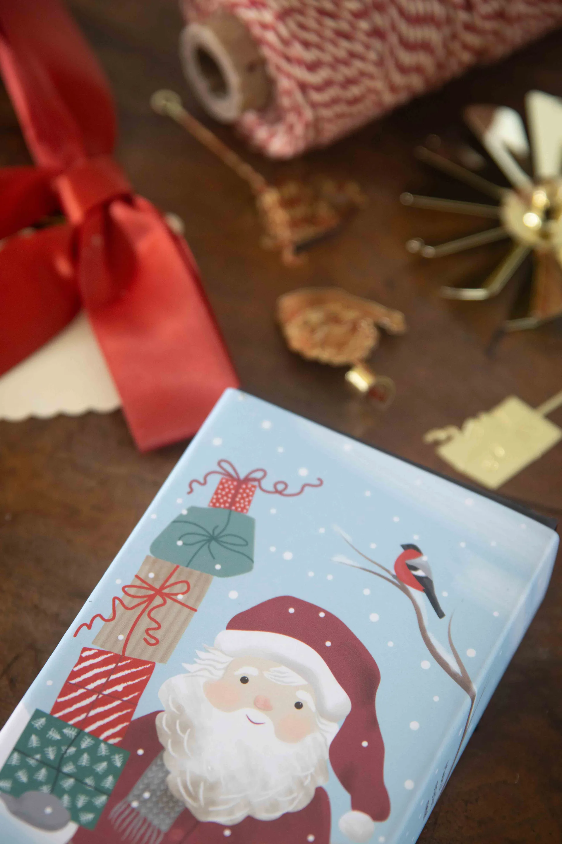 Merry christmas englespill, Gull Pluto Design