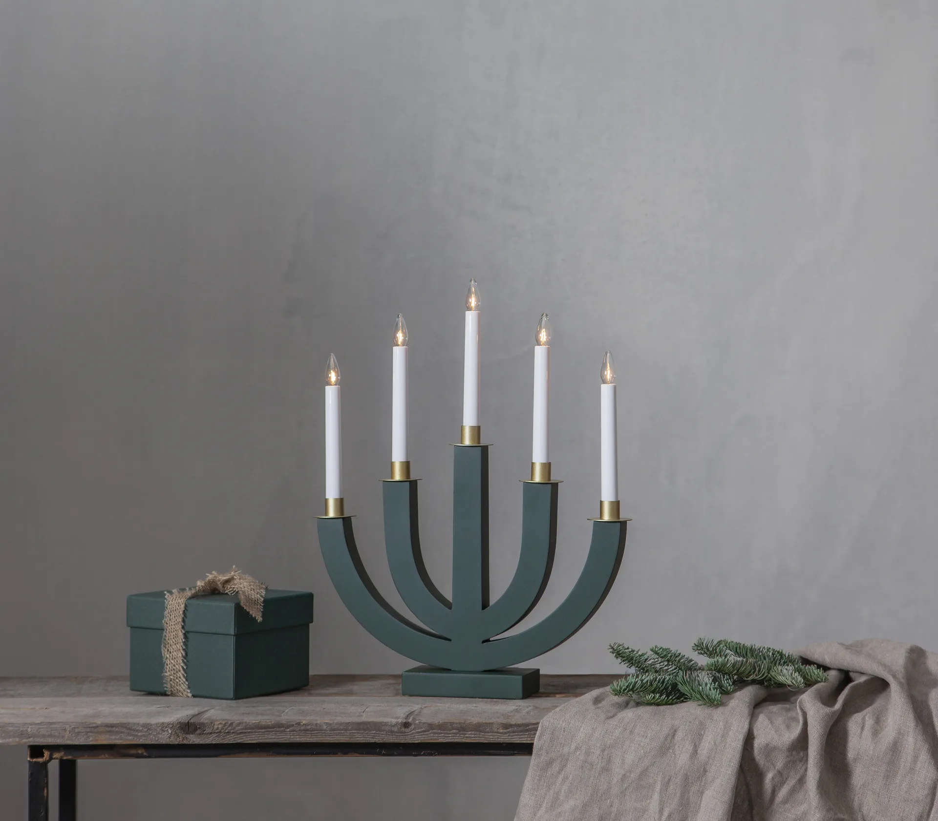 Eli adventslysestake, Grønn Star Trading