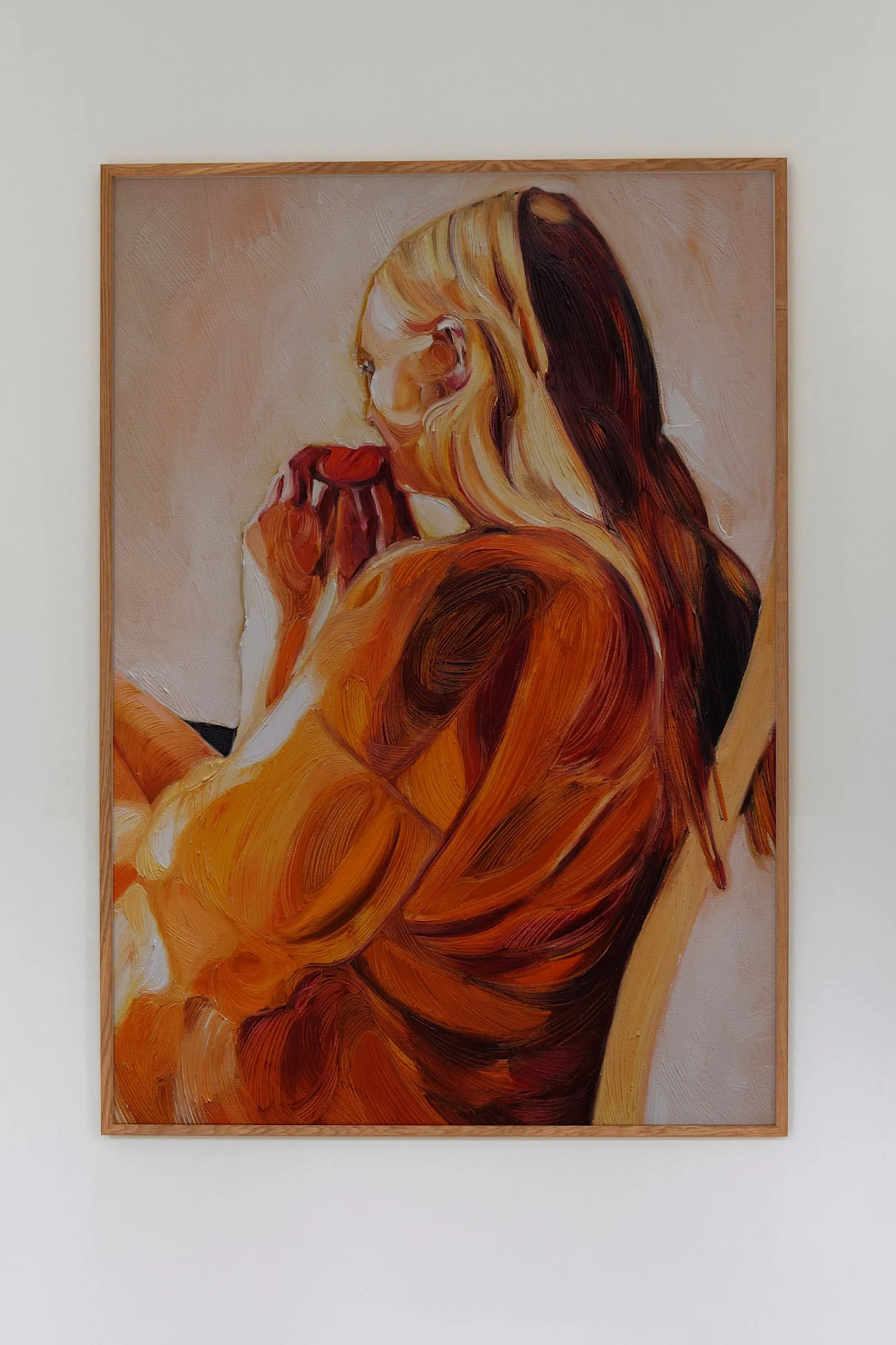 Plakat fra Paper Collective i oransje toner med et malt motiv av en kvinne.