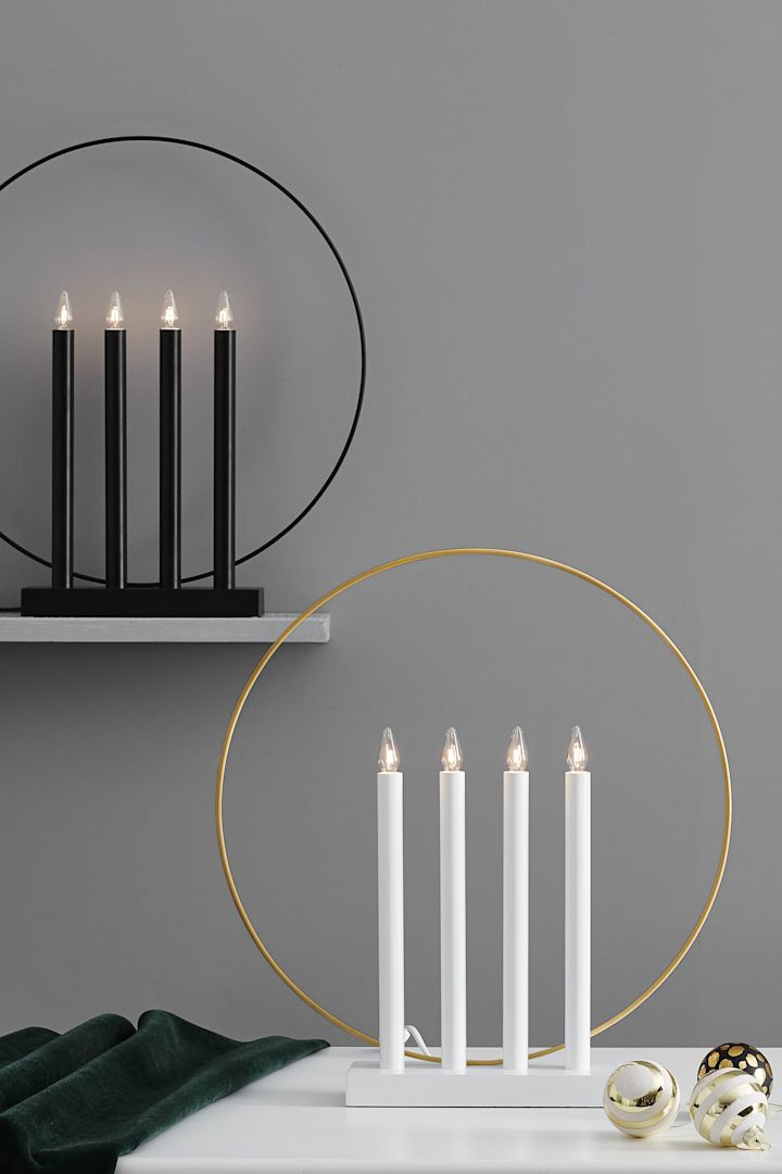 La deg inspirere av fine adventsstaker til jul - her ser du den stilige og moderne Glory adventsstake i svart, hvitt og gull fra Star Trading. 