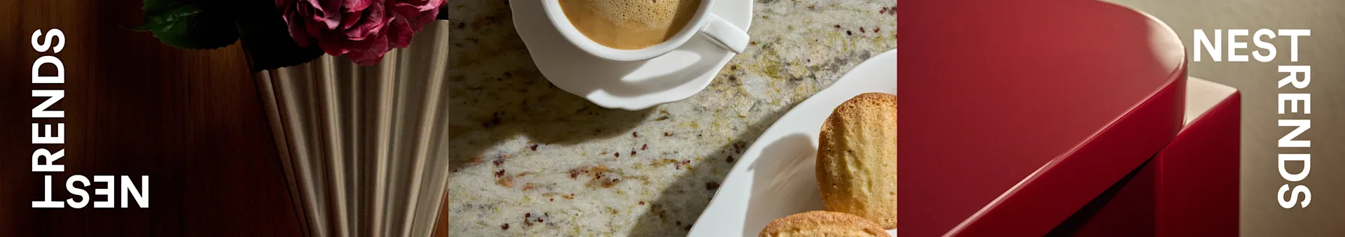 Kaffekopp, madeleinekaker og en rose i riflet vase på flekkete benkeplate ved siden av rød boks med 'NEST TRENDS'.