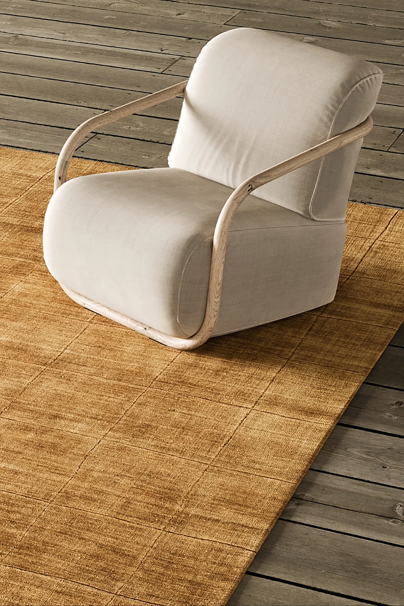 Her er Hunk-lenestolen fra Hem avbildet i en mørk brun tone som gjenspeiler fargetrender interiør 2026.
