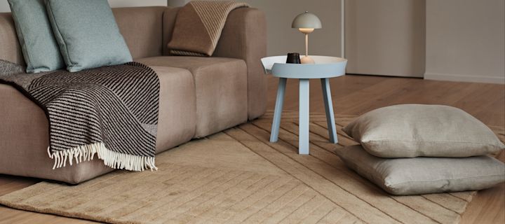 Levels ullteppe Stripes beige fra NJRD gir et koselig inntrykk i hjemmet.